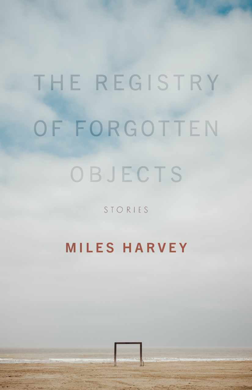 Front cover of The Registry of Forgotten Objects: Stories, by Miles Harvey, featuring a photo of a beach shoreline that is mostly sky, with an indeterminate metal object like a gateway or opening standing upright in the sand.